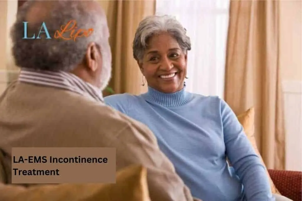 Couple sat smiling at each other - LA-EMS treatment Chingford